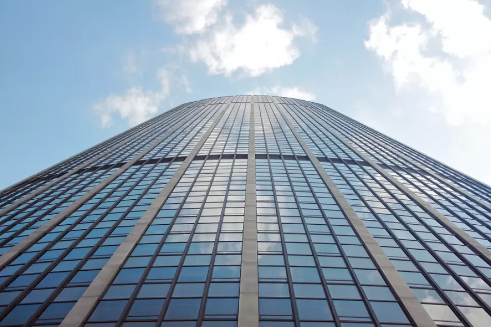 View of sky reflected in windows of Tour Montparnasse in Paris